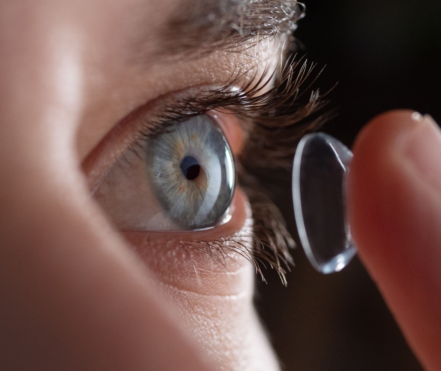 Contact lens being put into an eye