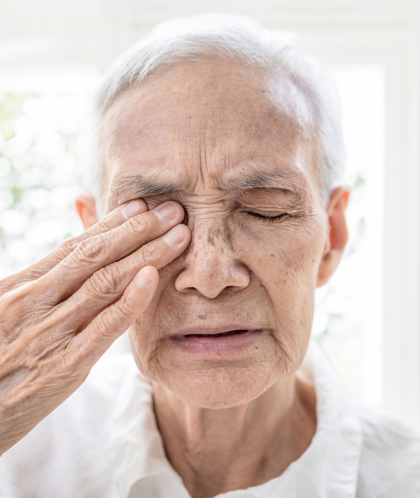 Photo of a older man suffering from eye issues